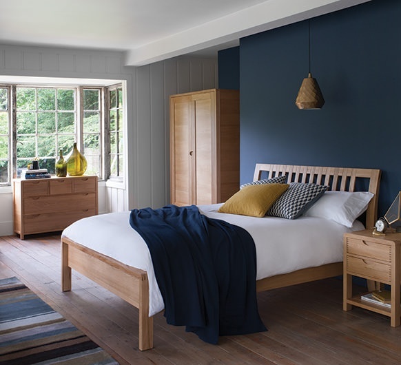 Ercol Bosco Bed in a modern bedroom setting