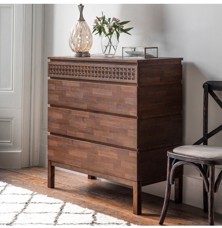Gallery Boho Retreat 4 Drawer Chest against a white wall in a contemporary home