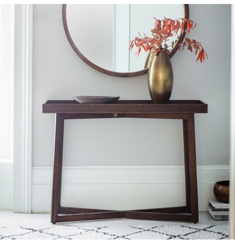 Gallery Boho Retreat Console Table against a white wall in a contemporary home