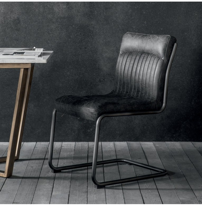 Gallery Direct Capri Chair in Antique Ebony Leather styled as a modern executive home office chair with a minimalist desk.