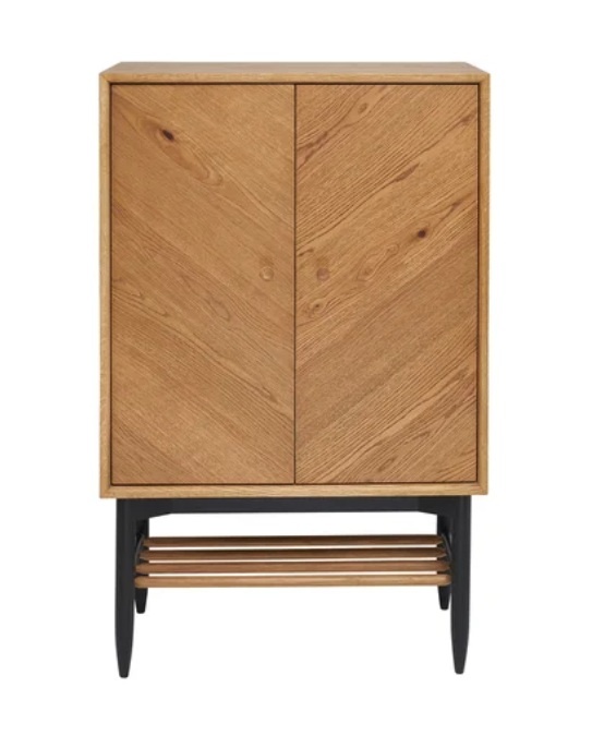 Ercol Monza 4066 Universal Cabinet in Patina Oak with herringbone doors and black spindle storage shelf - Front View