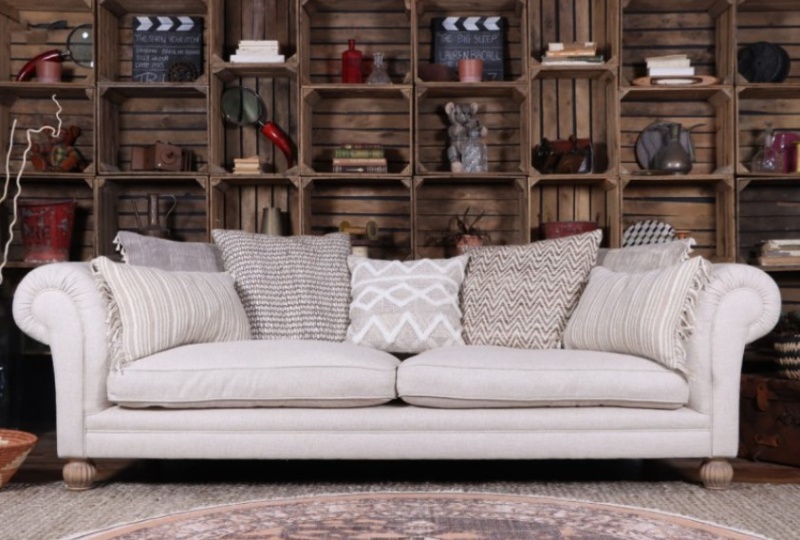 Tetrad Elgar 4 seater sofa in neutral fabric with patterned cushions at Brentham Furniture