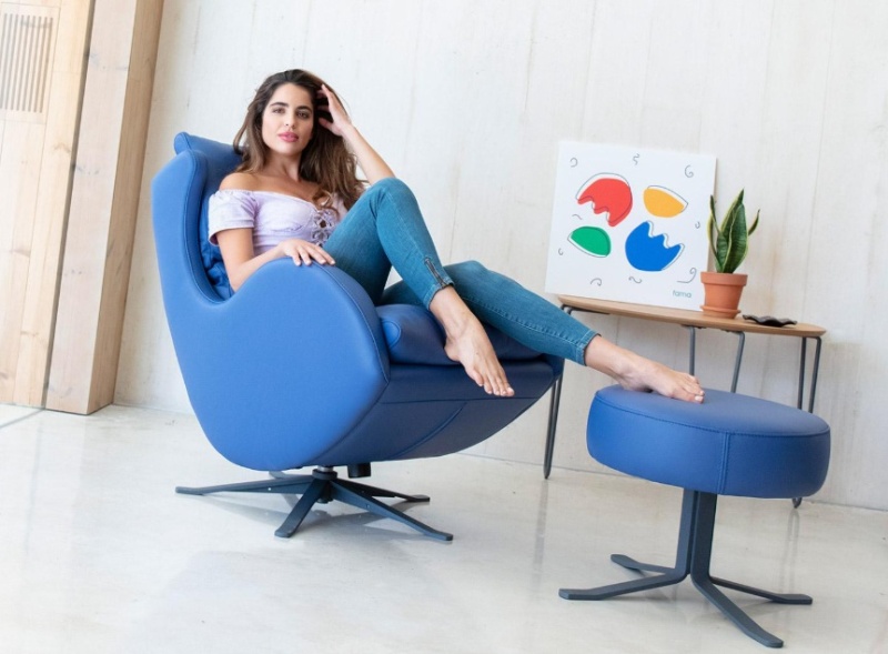 Fama Lenny swivel rocking chair in a modern living room
