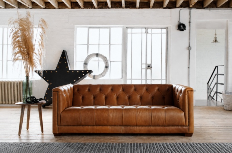 Tetrad Vagabond Petit Sofa in a modern white painted lounge