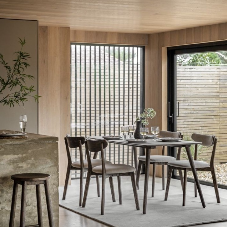 Gallery Hatfield Dining Table Large Smoked and matching chairs in a modern dining room