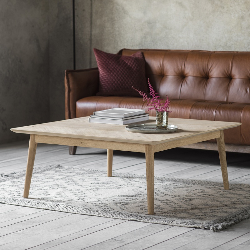 Gallery Milano Coffee Table in European oak with chevron inlay, matte lacquer highlighting natural grain and knots