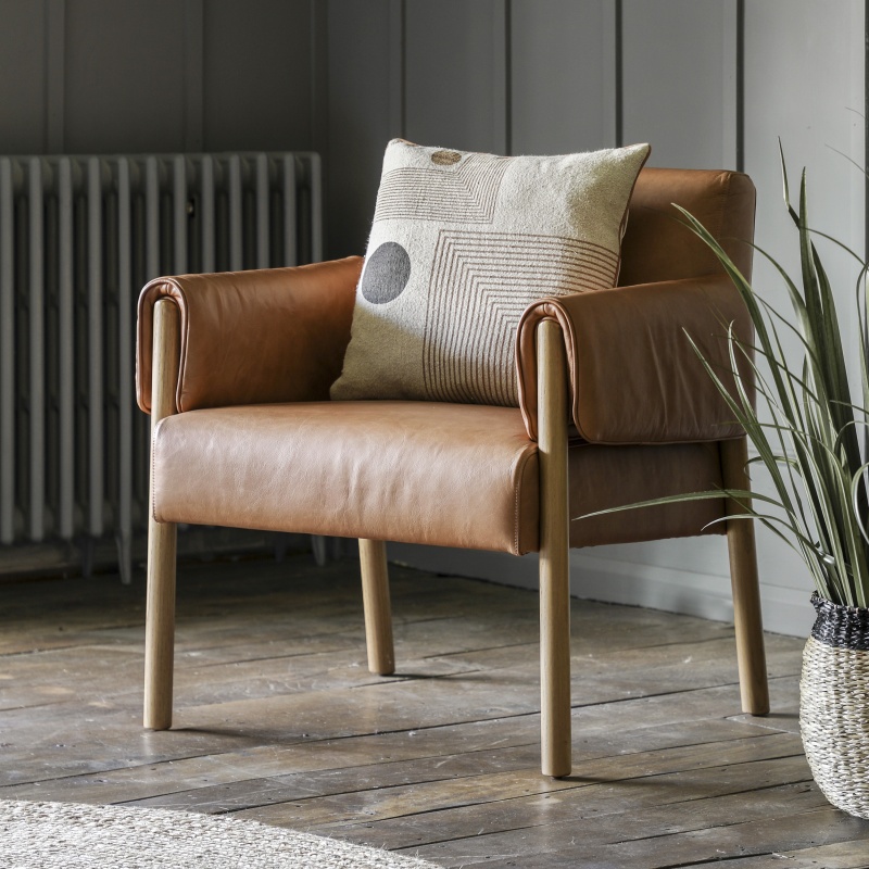 Gallery Direct Stratford Armchair Brown Leather with wooden legs and wrapped arms styled in a contemporary interior