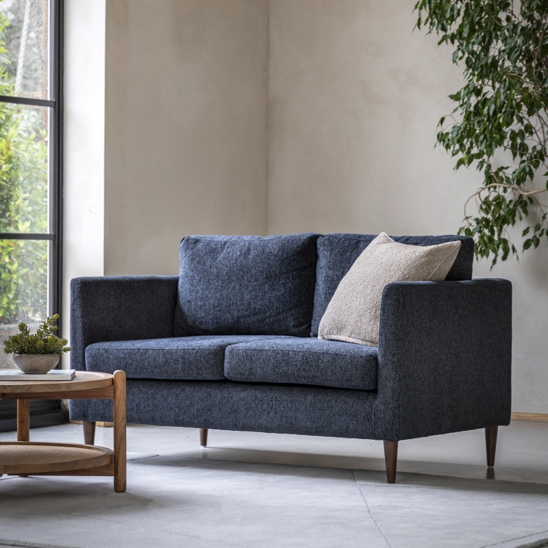 Gallery Direct Gateford 2 Seater Charcoal Sofa in a modern living room with coffee table and rug.