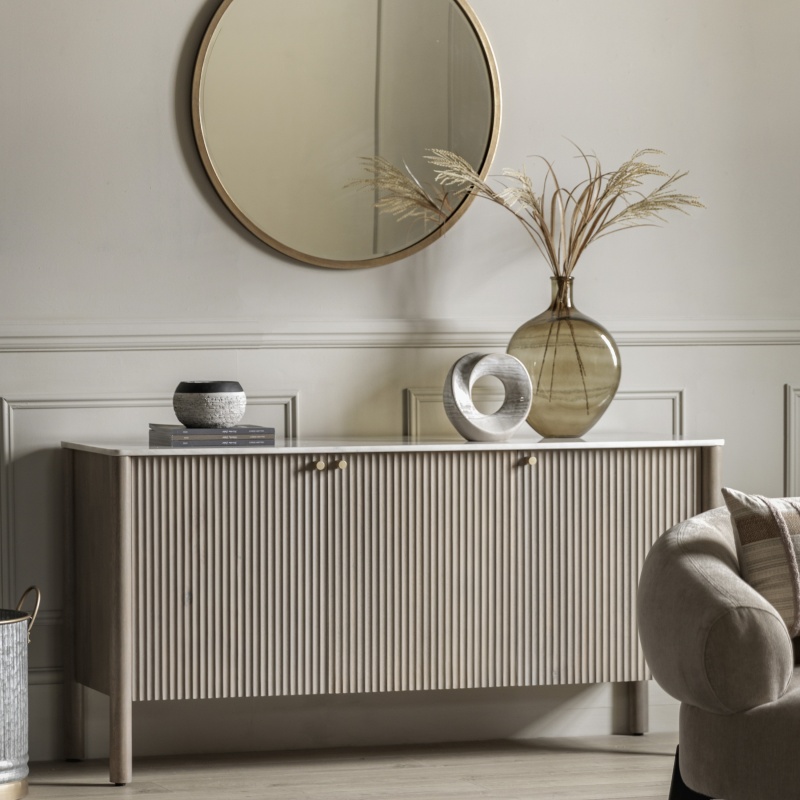 Luxury styled dining room featuring the Gallery Marmo Sideboard with fluted wood doors and a natural stone marble top.
