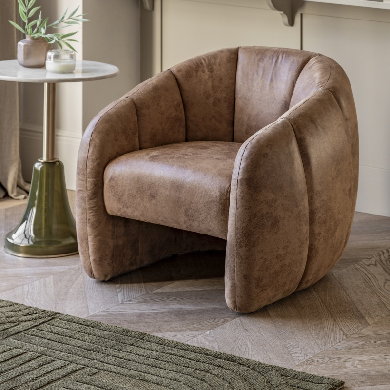 Gallery Direct Atella Tub Chair Antique Tan with curved tub design, antique tan leather upholstery & vertical stitched detail