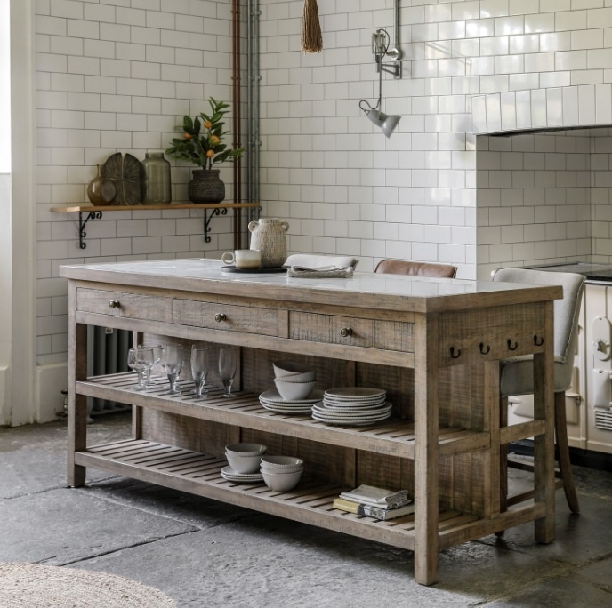 Rustic kitchen featuring the Gallery Vancouver Kitchen Island with marble surface, drawers and spacious shelves