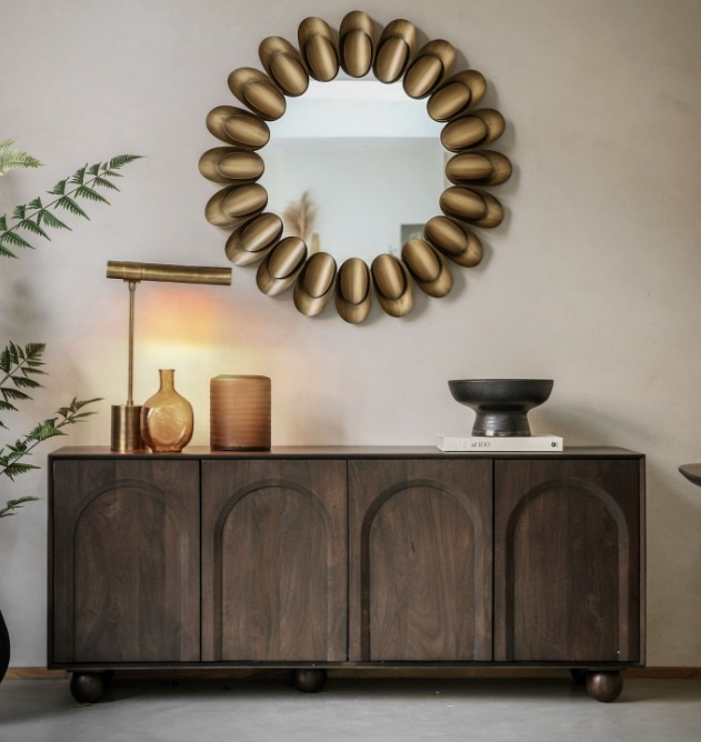 Stylish living room display featuring the Gallery Arc 4 Door Sideboard with arched door detailing and rich mango wood grain