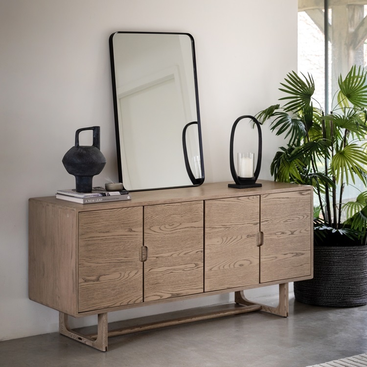 Gallery Direct Craft 4 Door Sideboard Smoke styled in modern space with solid oak frame and sleek profile