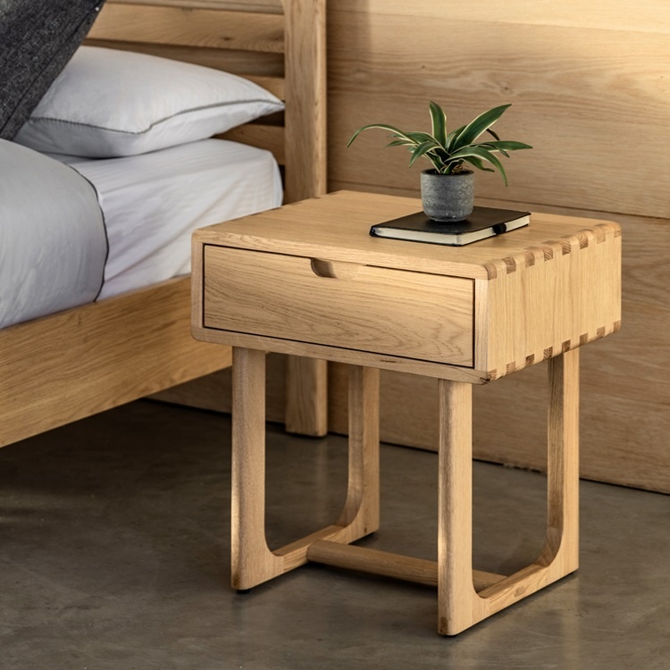 Gallery Direct Craft 1 Drawer Bedside Natural in solid oak with dovetail drawer beside wooden bed frame
