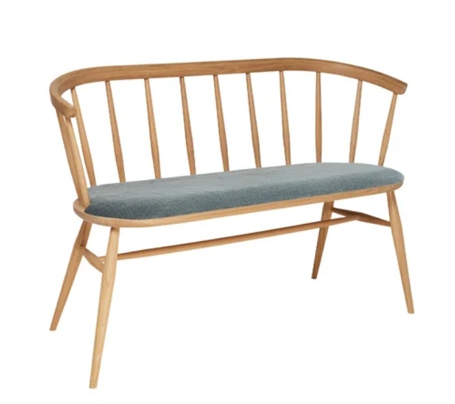 Ercol 4342 Heritage loveseat in natural oak with upholstered seat pad and spindle back