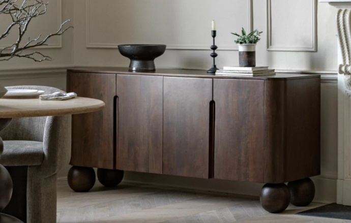 The Gallery Sculpt 4 Door Sideboard, a four door mango wood sideboard offering generous concealed storage
