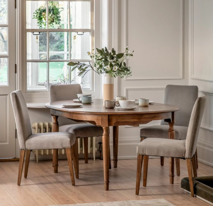 Dining room styled with the Gallery Direct Highgrove Extending Round Table seating six with classic new traditional design