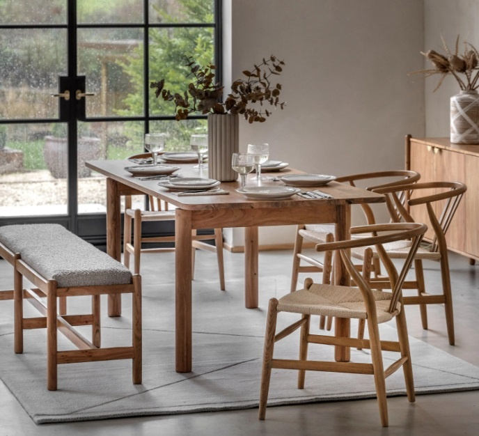 Gallery Direct Cannes Dining Table in a dining setting paired with other Cannes furniture