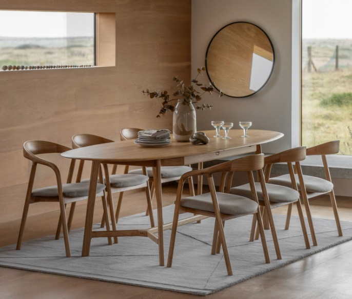 Gallery Direct Madrid Extending Dining Table Oak styled in a modern dining room with natural oak finish and minimalist design