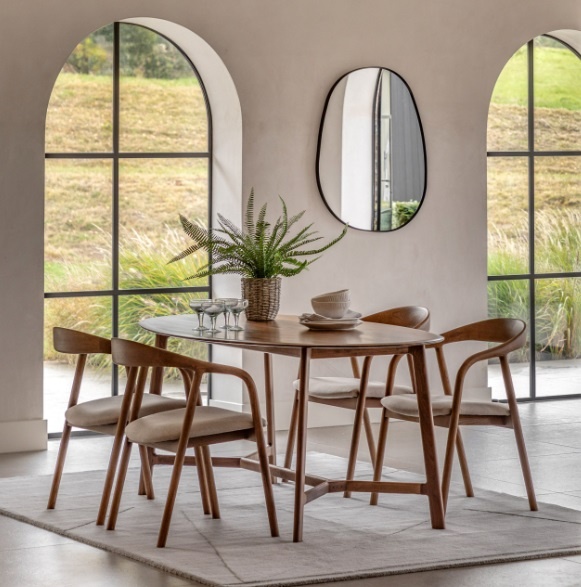 Gallery Direct Madrid Oval Dining Table Walnut in a contemporary dining setting