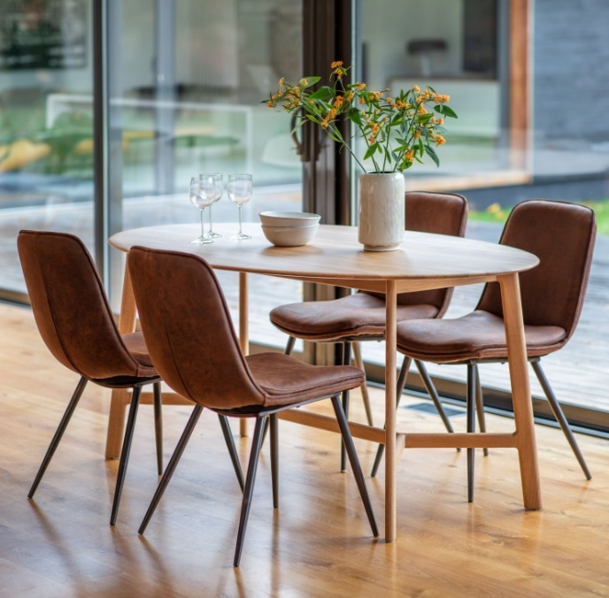 Gallery Direct Madrid Oval Dining Table Oak in a modern home