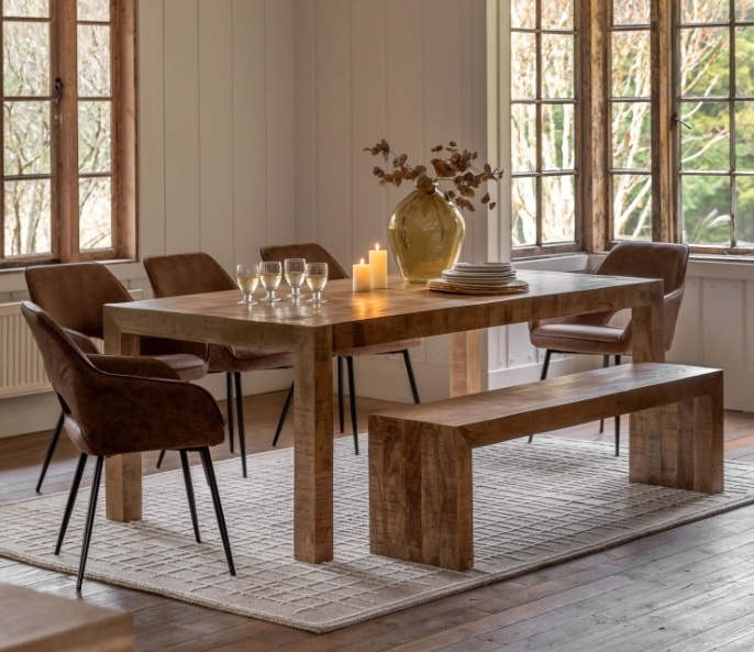 Gallery Iowa Dining Table Natural styled in a bright dining space, showcasing the solid mango wood design and seating for six
