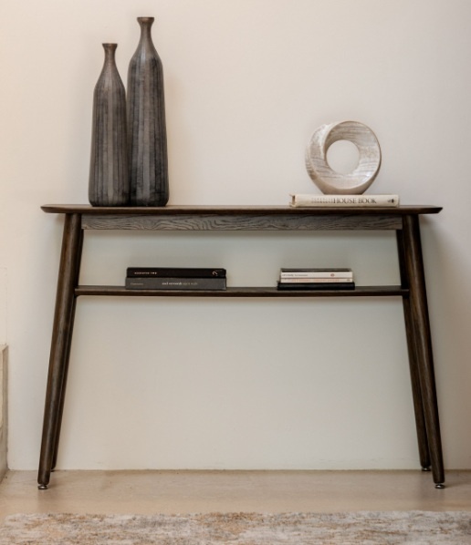 Gallery Hatfield Console Natural Smoked against a light colour wall on a wooden floor