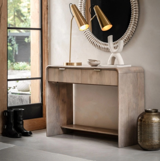 Gallery Colonna 2 Drawer Console in natural mango wood with curved top and fluted drawers styled in an entryway