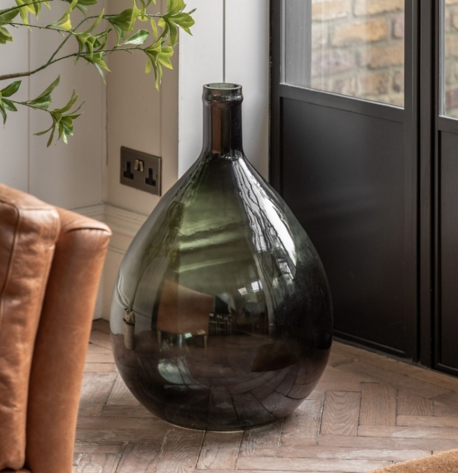 Rueda Giant Glass Bottle Vase Olive in a modern home