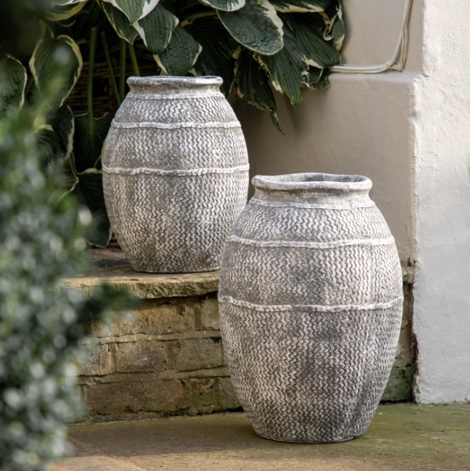 Zante Vase Small Antique Grey paired with its larger sibling in a natural setting