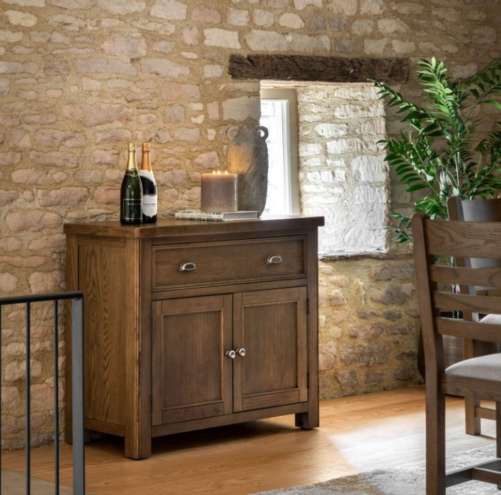Gallery Direct Hardwick Oak 2-Door 1-Drawer Sideboard in a rustic setting