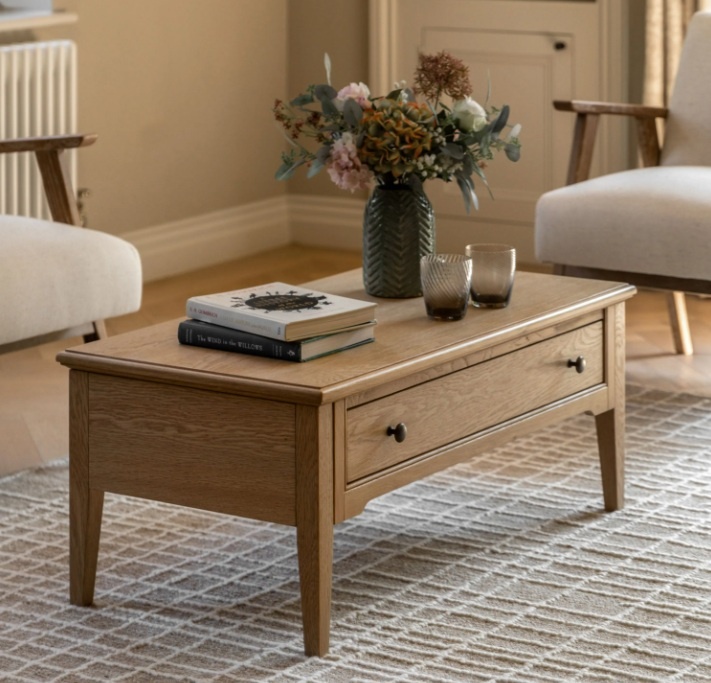 Gallery Direct Malvern 1 Drawer Coffee Table showcased in lounge with vase on top and books