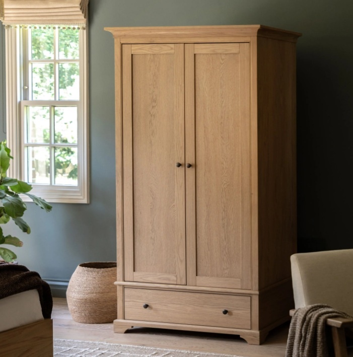 Gallery Direct Malvern 2 Door 1 Drawer Wardrobe in bedroom with wood floor next to window and plant