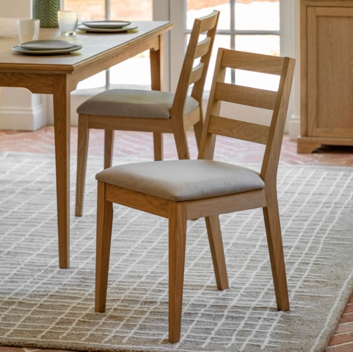 Gallery Direct Malvern Dining Chair on check rug next to table