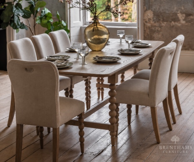 Gallery Direct Artisan extending dining table with 6 upholstered dining chairs