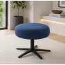 Fama Lenny footstool with black star base in a modern living room
