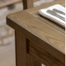 Gallery Direct Hardwick Extending Dining Table showcasing table edge detail with knife and fork set on top