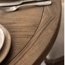 Gallery Direct Hardwick Round Extending Dining Table showcasing top detail with rich wood grain