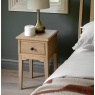 Gallery Direct Malvern 1 Drawer Bedside in bedroom next to bed and lamp on top