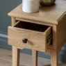 Gallery Direct Malvern 1 Drawer Bedside showcasing drawer pulled out with metal handle