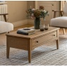 Gallery Direct Malvern 1 Drawer Coffee Table showcased in lounge with vase on top and books