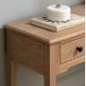Gallery Direct Malvern 1 Drawer Console Table with book and candle on top