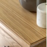 Gallery Direct Malvern 9 Drawer Chest showing wood grain close up of top