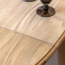 Gallery Direct Malvern Round Extending Dining Table showing join in centre of table