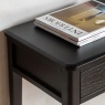 Gallery Direct Acton 2 Drawer Console Black close up with magazines on top