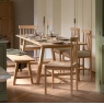 Gallery Direct Eton Natural Extending Trestle Dining Table and chairs in kitchen setting