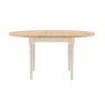Gallery Direct Eton white round extending dining table shown fully extended with centre leaf in place