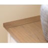 Detail of the natural oak top on the Gallery Direct Eton small sideboard with painted white base