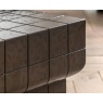 Close up detail of the Gallery Direct Novara coffee table showing charcoal brown concrete tile texture