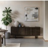 Gallery Direct Onda four door sideboard in walnut finish styled in a modern lounge space